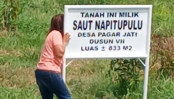 
					Plang keluarga Napitupulu diduga dicopot Oknum kades